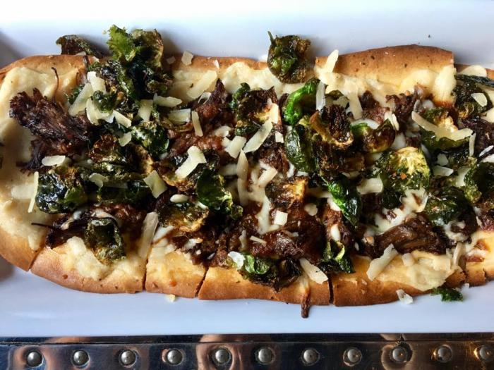 Matilda Flatbread: Short & Sprout: roasted garlic béchamel, braised short rib, and crispy brussels sprout leaves