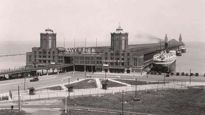 This picture displays part of the history of Navy Pier.  The El would drop passengers off inside the pier where they could board boats, including Goodrich boats