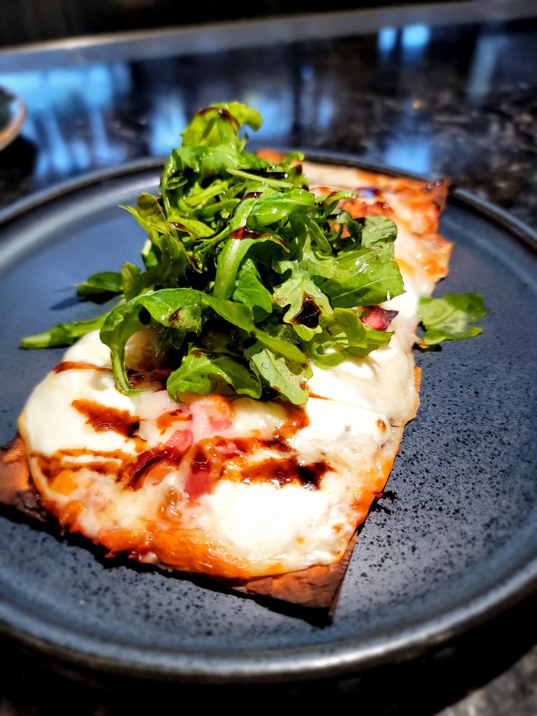 Prosciutto Flatbread at Oaken Bar + Bistro